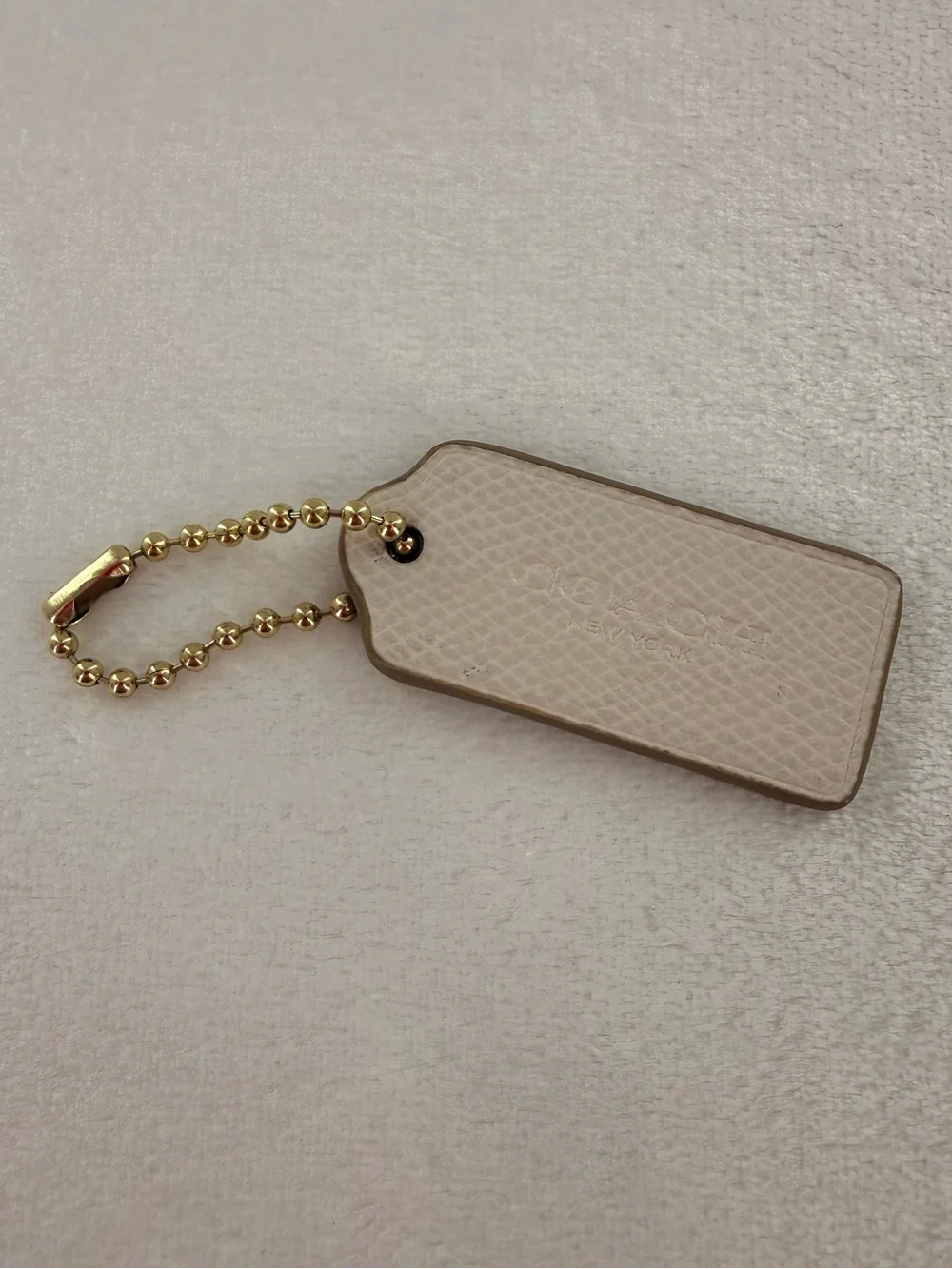 Coach Cream Bag Tag